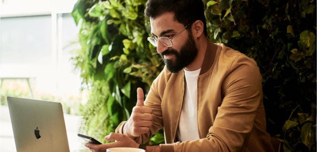 Image of professional working on a laptop