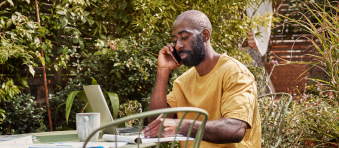 photo of a person talking on a phone