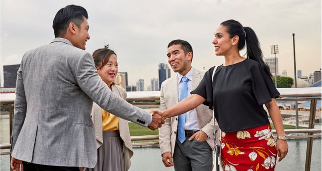 Image of professionals shaking hands