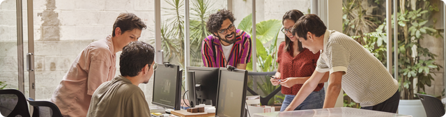 Creative team collaborating in modern office