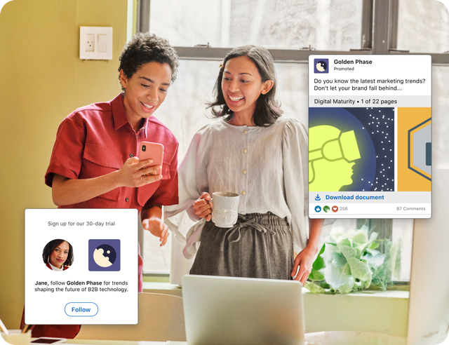 Coworkers review digital marketing content together