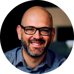 Professional headshot of Joshua Rischin