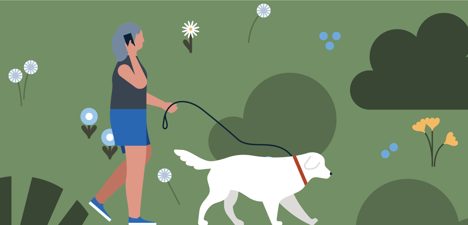 Woman walking dog