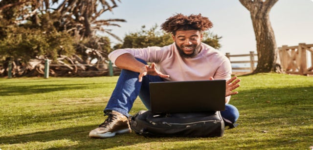 Image of professional on a laptop