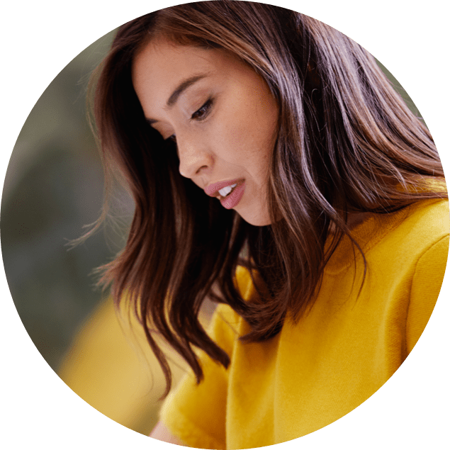 Woman in yellow sweater