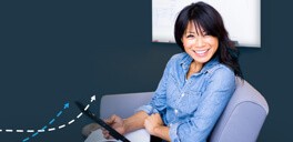 Smiling woman with tablet