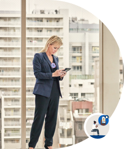 An illustration of a woman sitting and looking at something projected from her phone