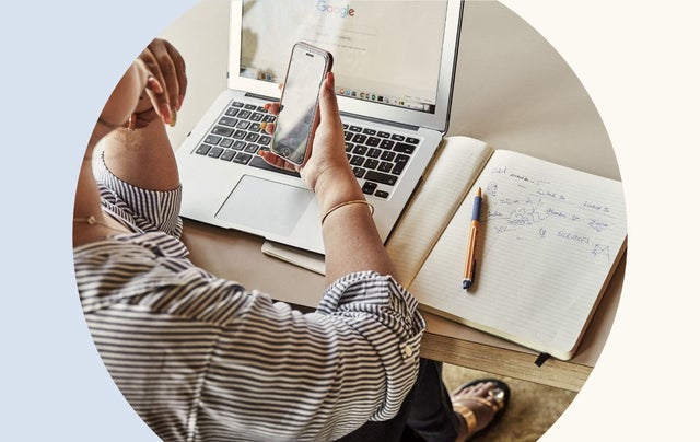 Image of professional looking at mobile