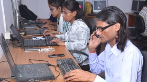 Image of professionals working on computers