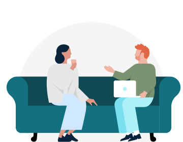 Two people sitting on a couch having a conversation