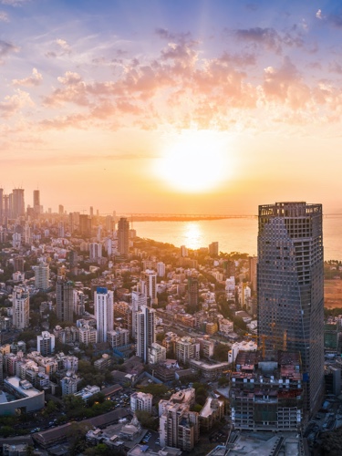 Aerial view of sunset over city in India