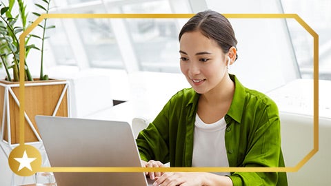 Image of person looking at laptop