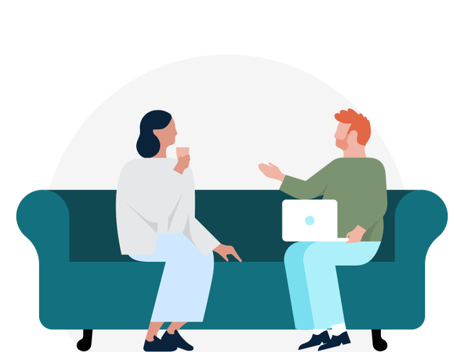 Two people sitting on a couch having a conversation