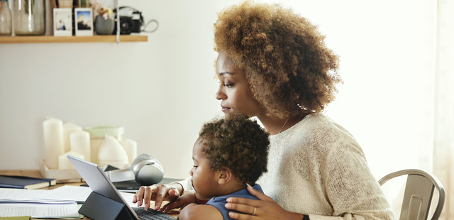 woman & child looking at computer
