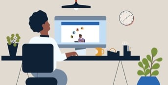 Woman at her desk watching a presentation