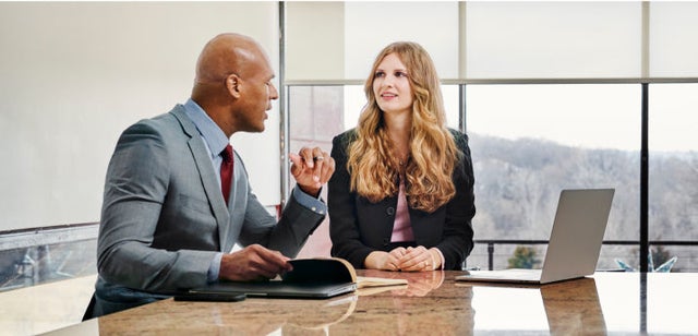 Image of professionals having a conversation