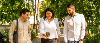 photo of three people in conversation