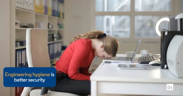 woman with head on computer keyboard