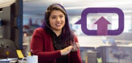Image of woman smiling with headset on