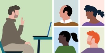 A man sitting at this desk and speaking with four coworkers through a video conference.
