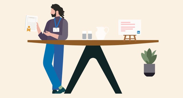 Image of professional standing at a desk