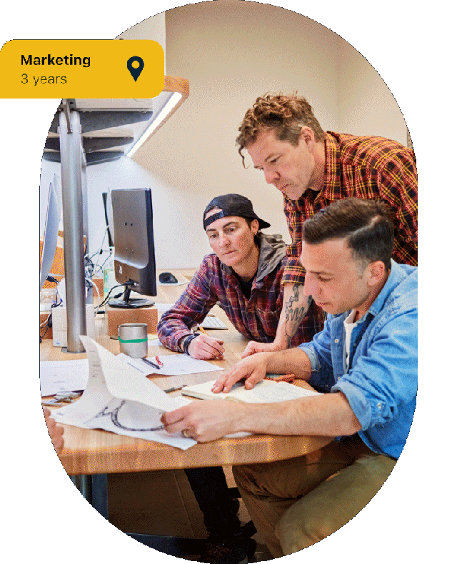 Creative marketing team collaborating in office