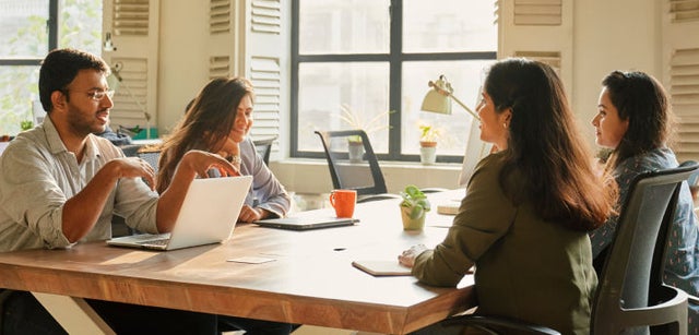 Image of professionals having a conversation