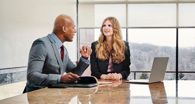Image of professionals having a conversation