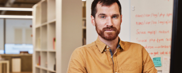 Image of man looking at camera
