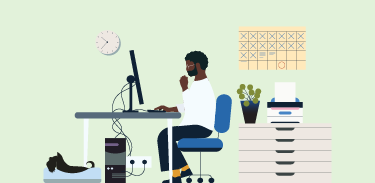 man working on a computer in office space