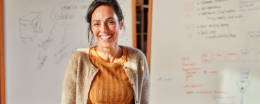 Image of woman smiling at camera