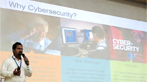Image of professional giving a presentation on cyber security